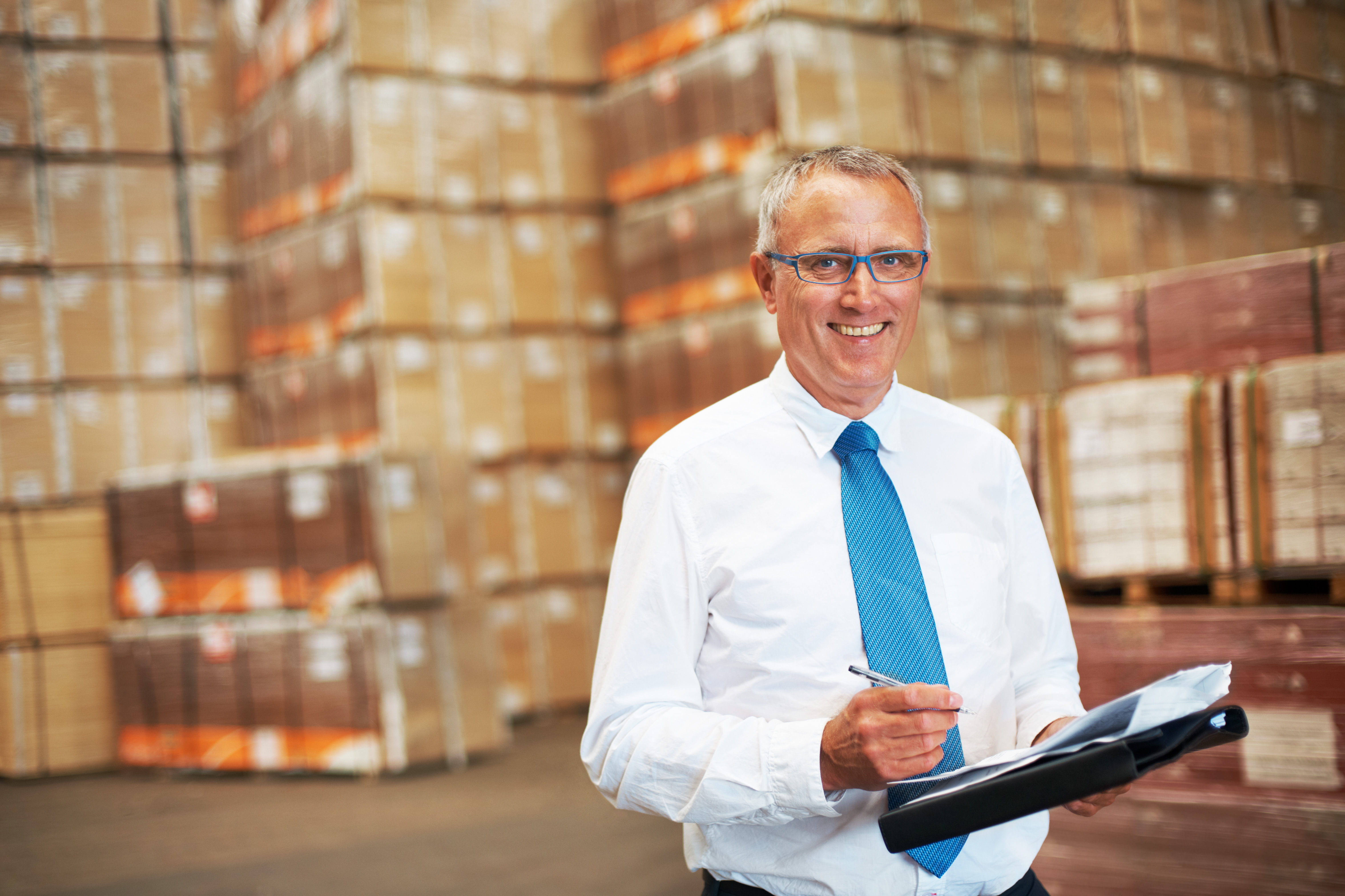 a-storage-warehouse-manager-standing-in-the-factor-2026-01-09-11-08-56-utc